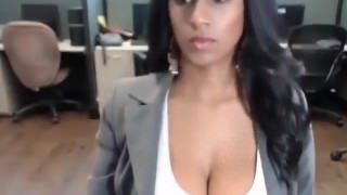 Hot busty latina rubs clit on webcam in a office